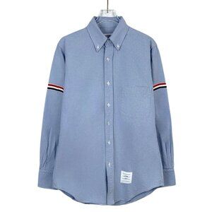 CM0371 Thom Browne Button-Up Shirt In Light Blue With Signature Stripe Accents C